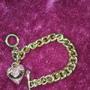 Juicy couture gold bracelet with pink rhinestones