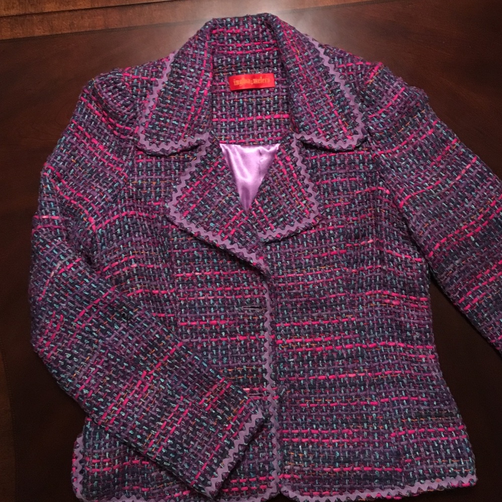 Purple tweed skirt suit. Slightly worn.