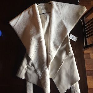 Fur/leather vest with tags (never worn!)