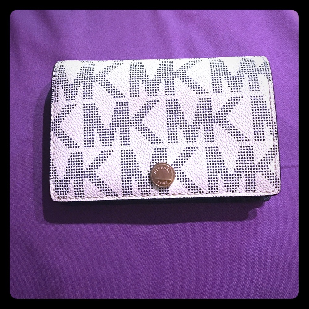 Michael Kors fold over wallet in navy blue/white