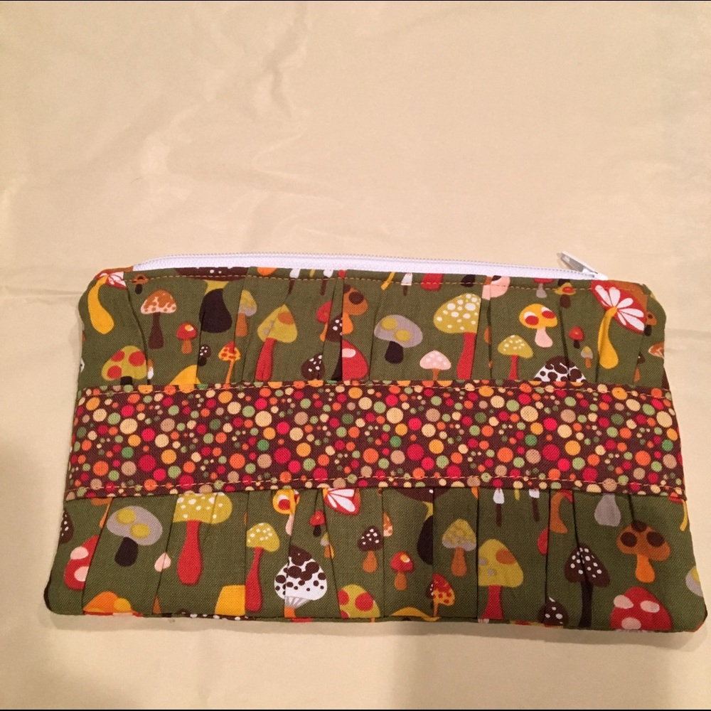 Handmade, small fabric mushroom clutch.
