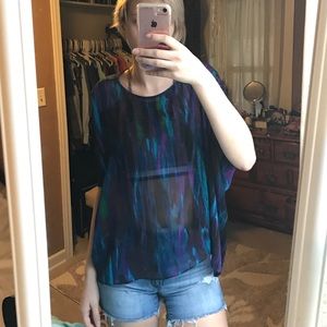 Draped see through top.