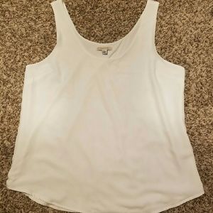 Plain white polyester tank.