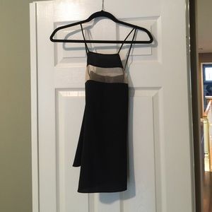 Angl black top with cut out. Size m. Never worn