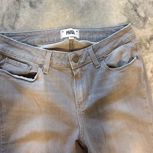 Grey distressed skinny jeans