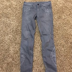 Gray tribal skinny jeans