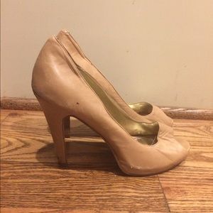 Nude peep toe pumps