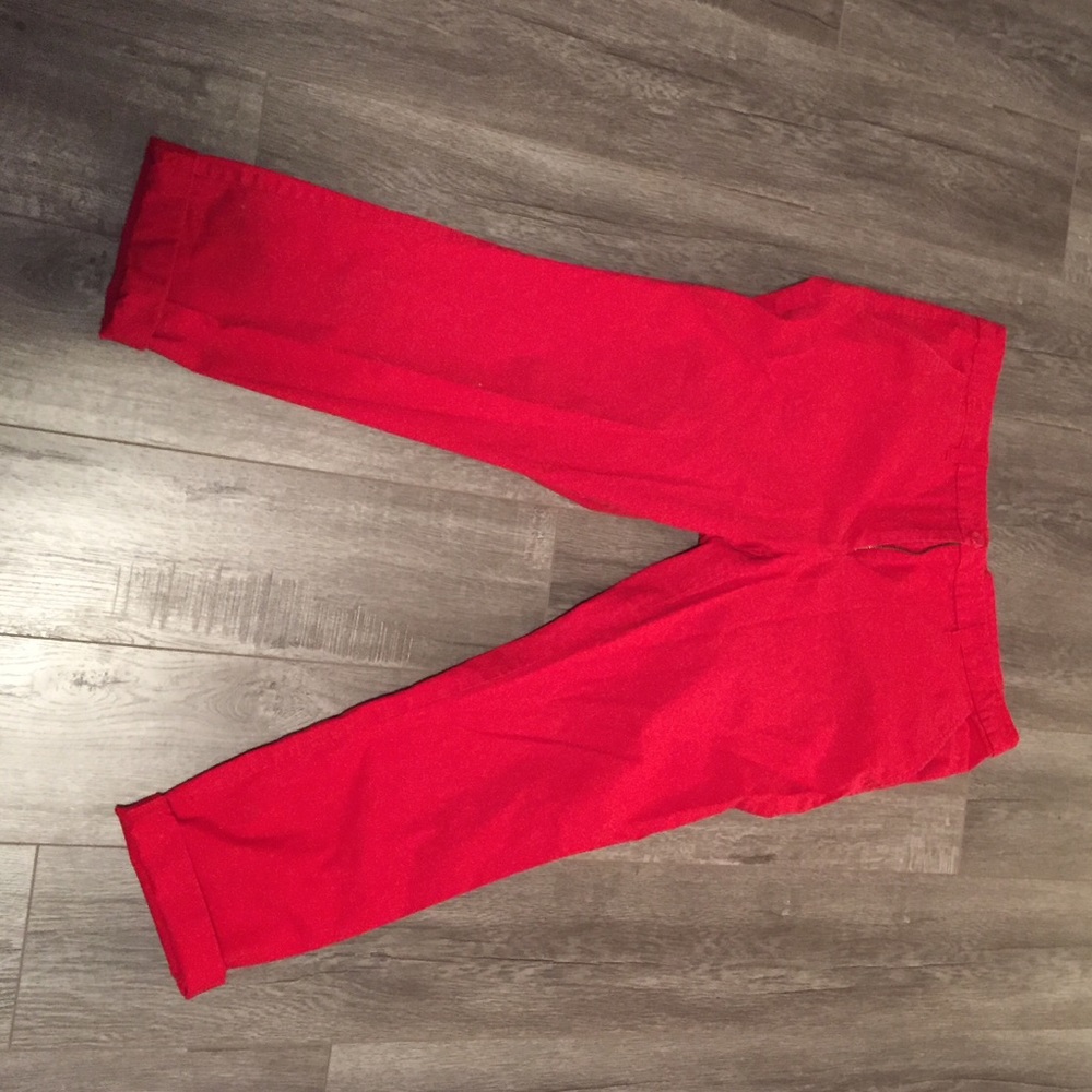 Bright red ankle pants.
