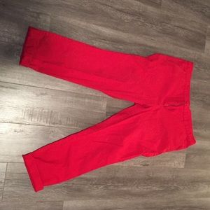 Bright red ankle pants.
