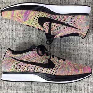 Nike multicolor flyknit racers. Size M6.5 W8