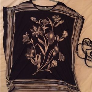 Never worn shirt size Medium