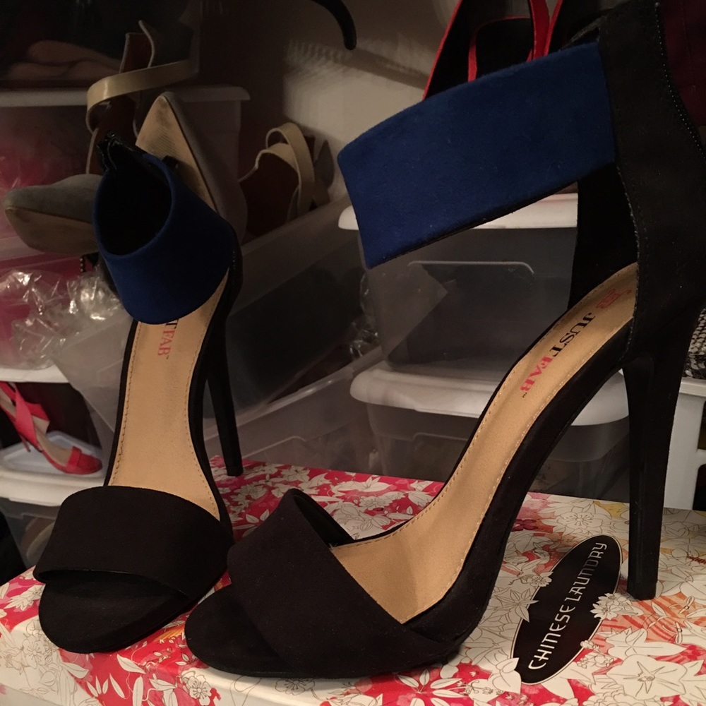 Black with royal blue ankle strap.