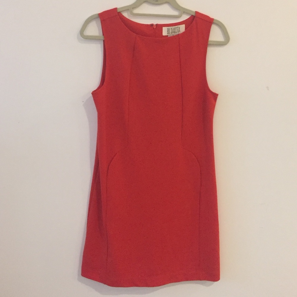 Coral dress with front pocket detail