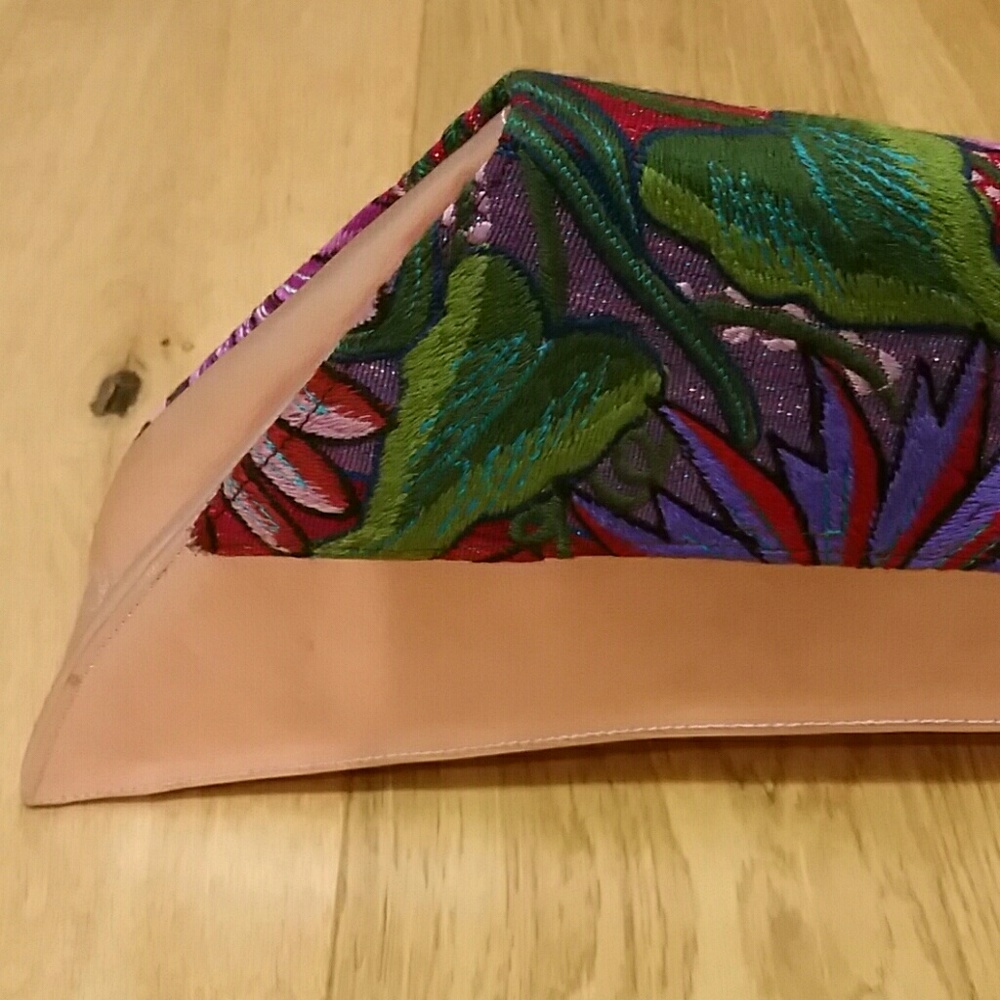 Statement asymmetric leather clutch