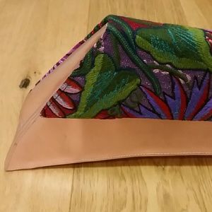 Statement asymmetric leather clutch