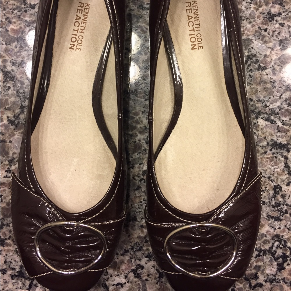 Brown Kenneth Cole flats with silver buckles