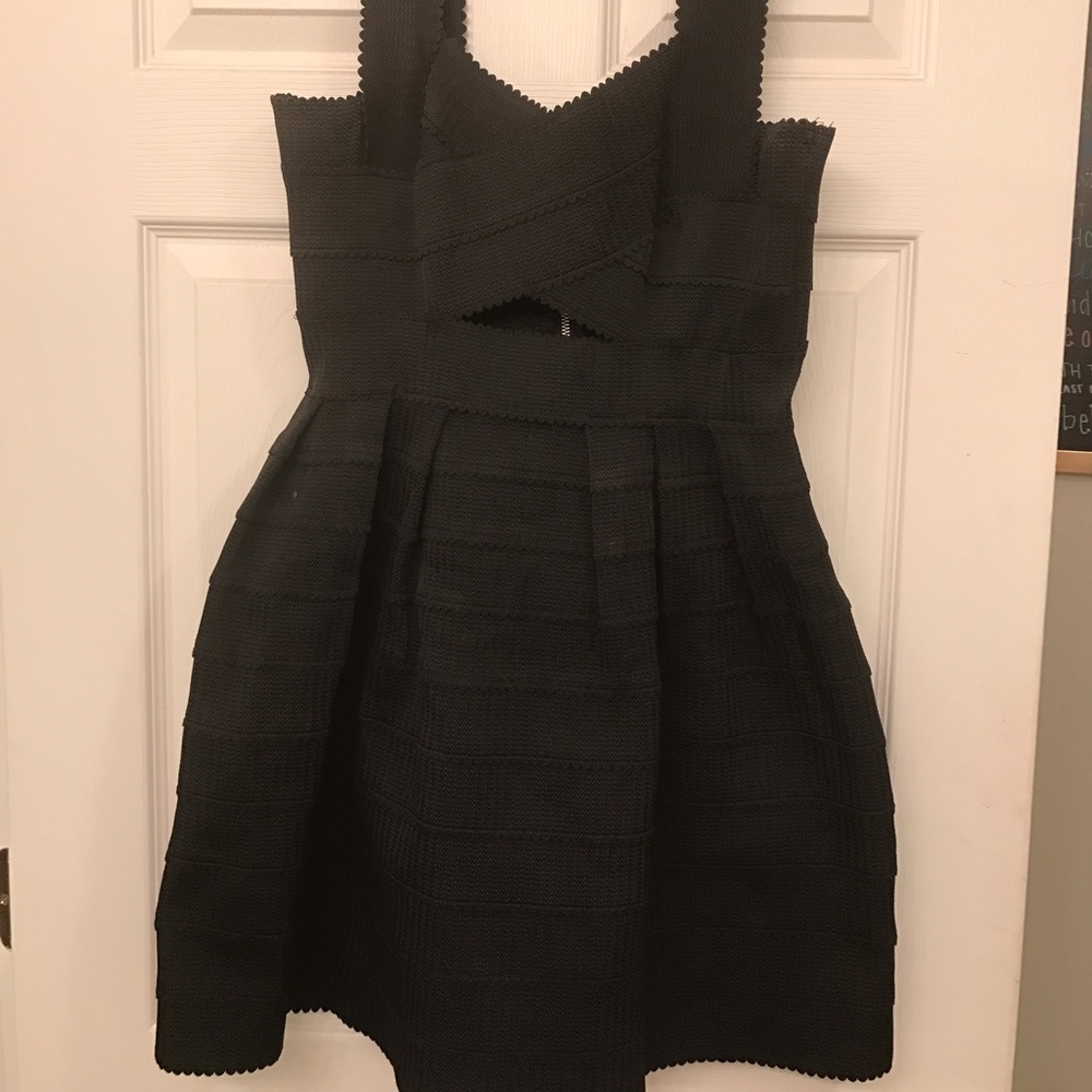 Mini black dress with cut out