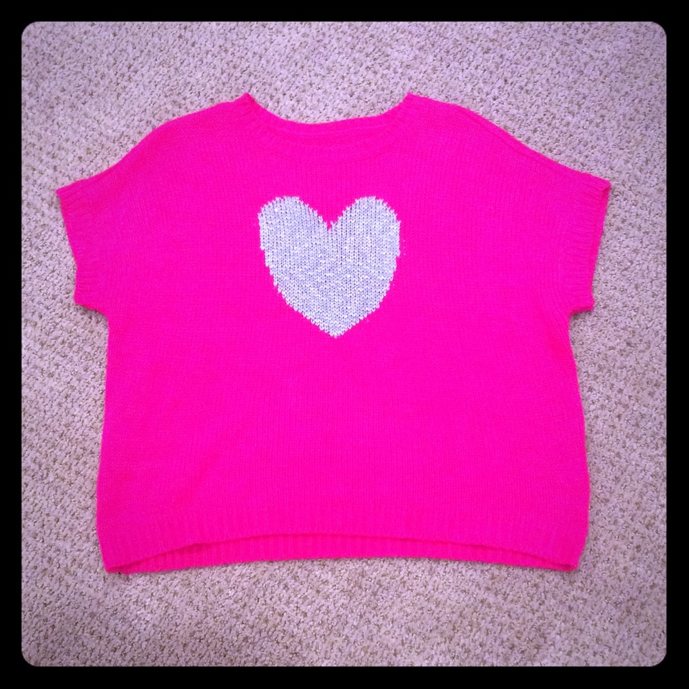Pink sweater.