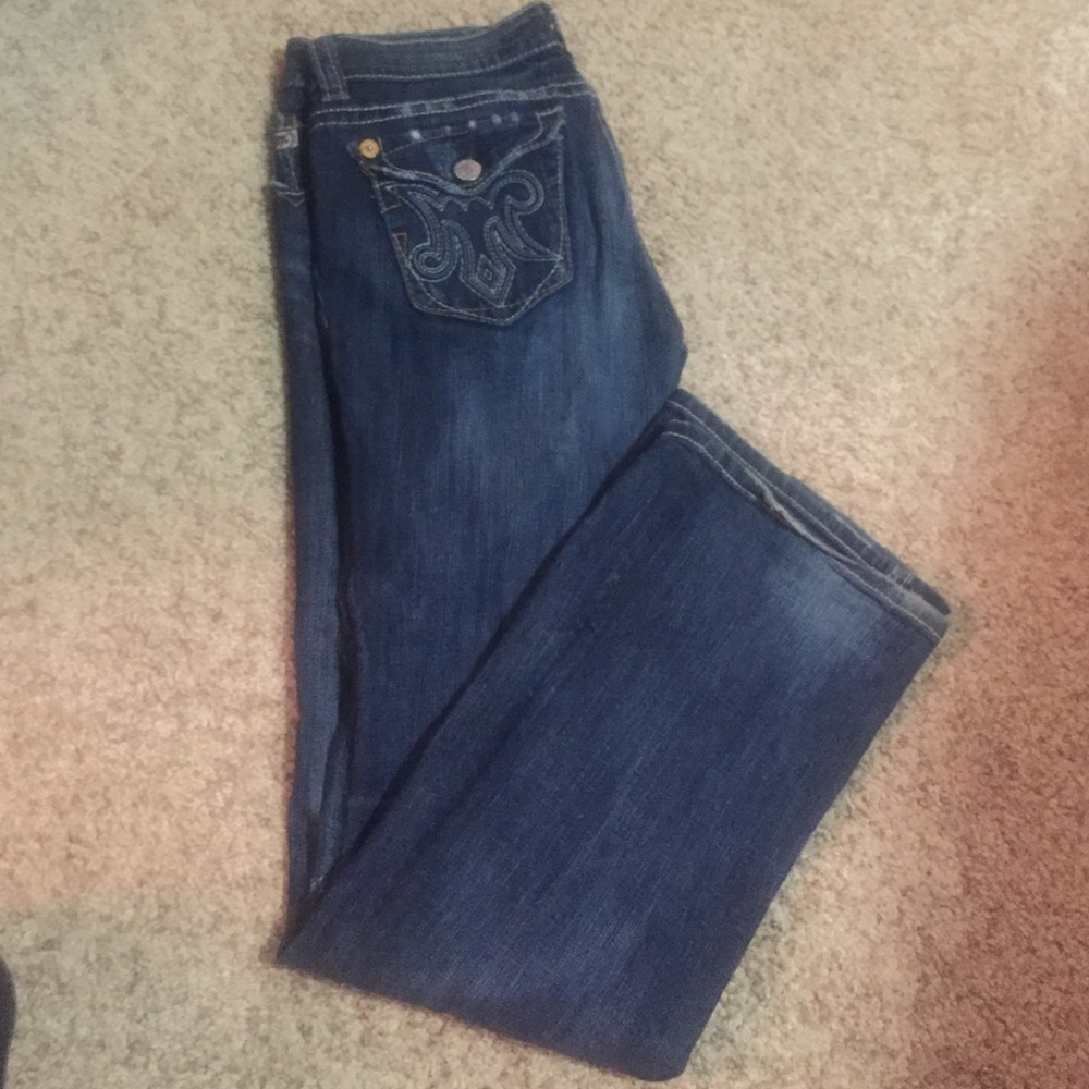 MEK denim bootcut lightly distressed jeans