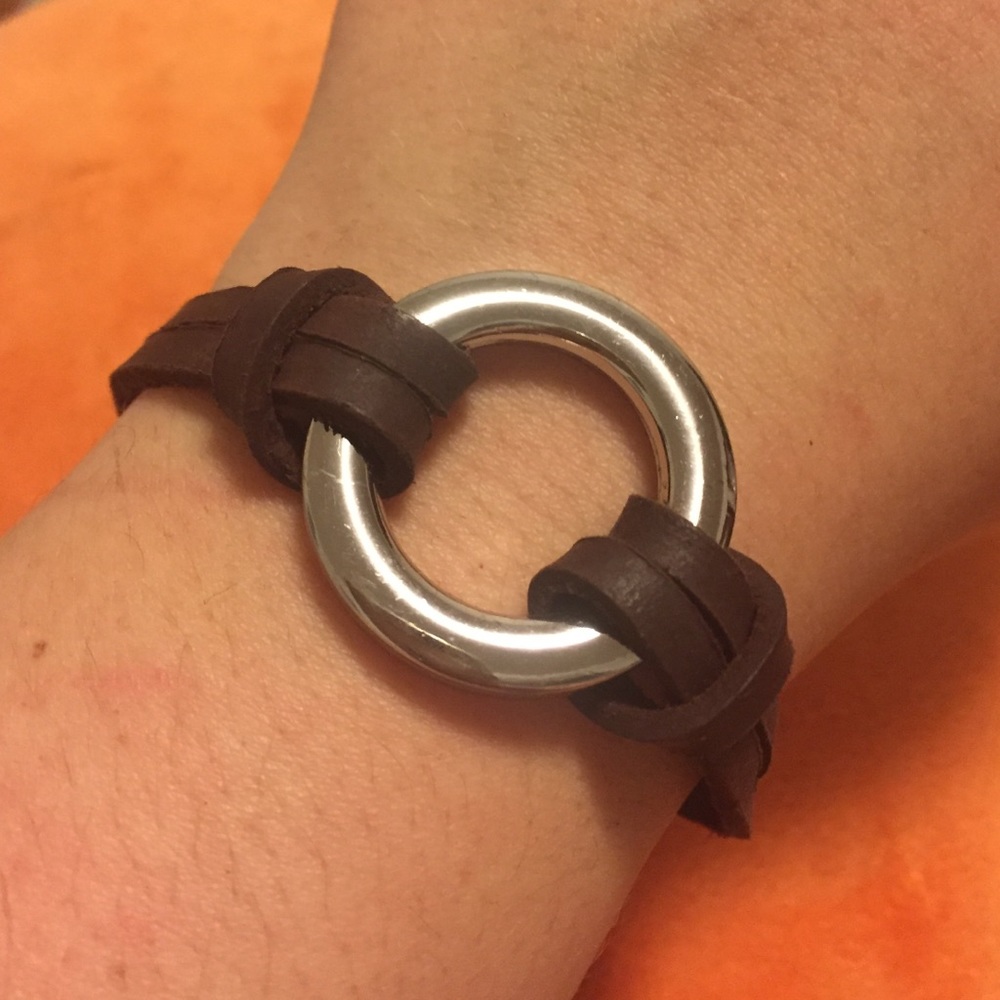 Brown leather bracelet with silver circle