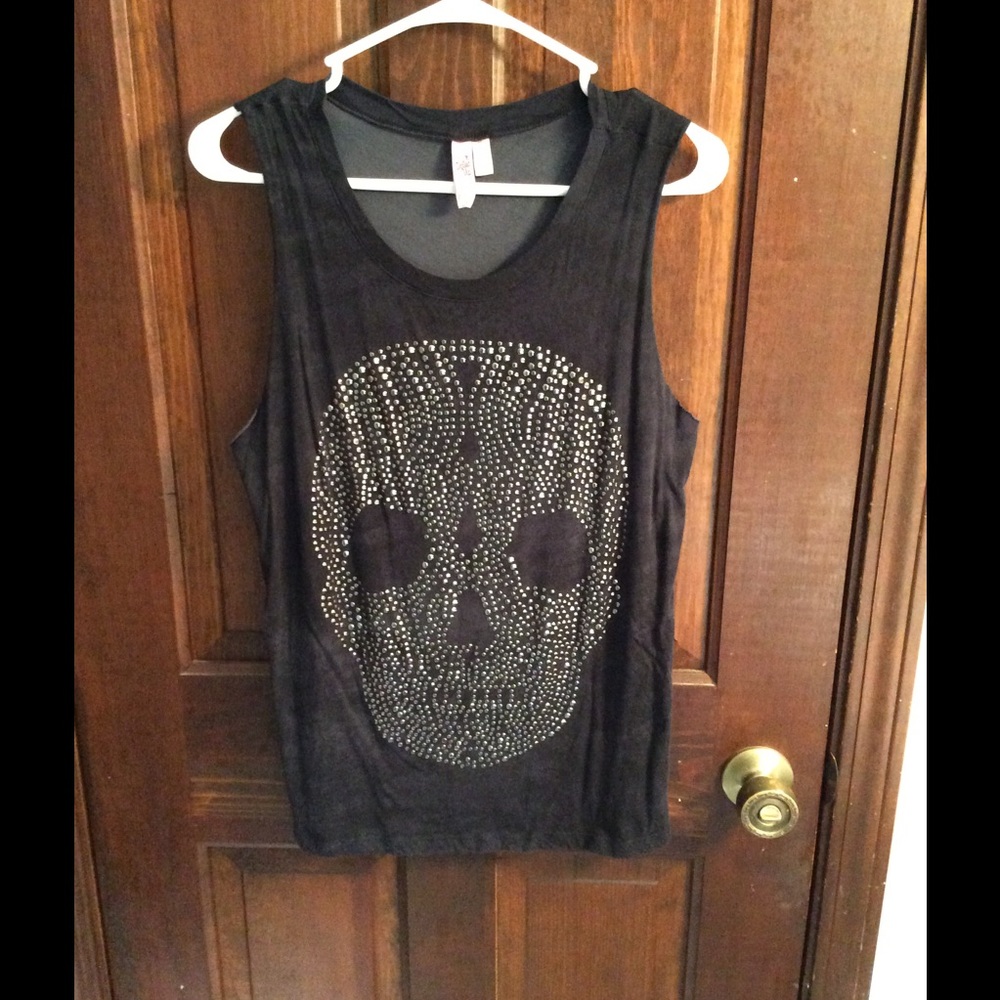 Black skull no sleeve top. Never worn