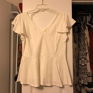 White peplum top