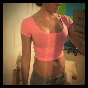 Pink crop top with strappy back to it