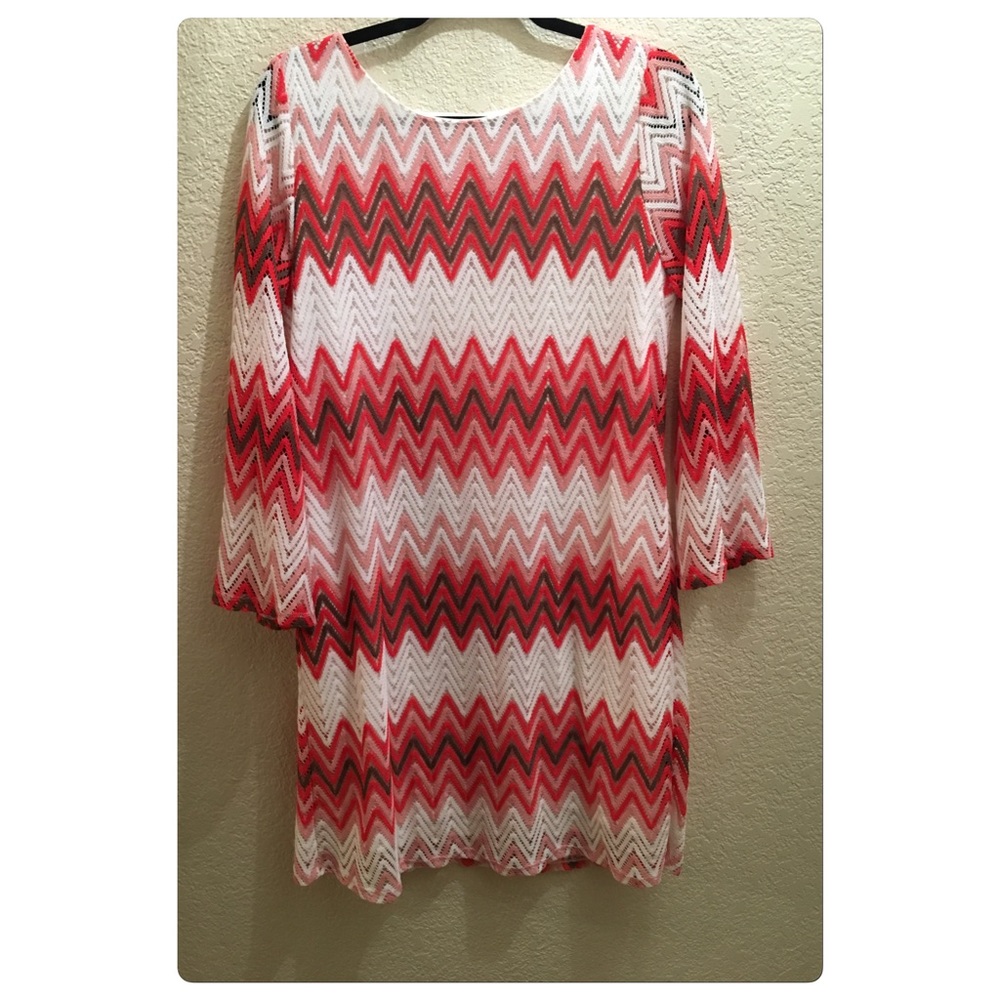Beautiful chevron dress with chorals.  Like new
