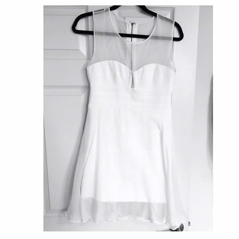 White mini Bebe dress. Size 8. Bodycon fitting