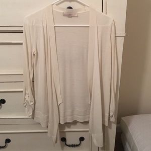 Open front flyaway cardigan.