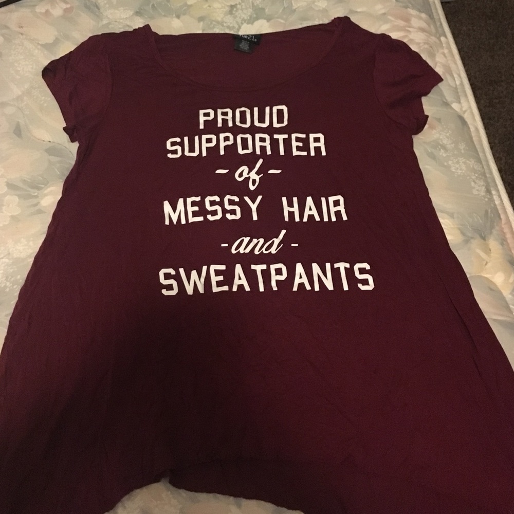 Proud supporter of messy hair and sweatpants shirt