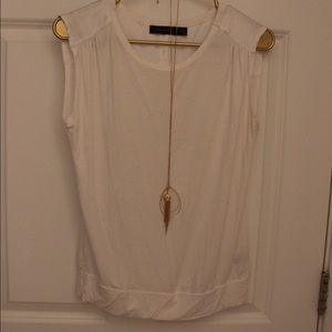 White sleeveless top