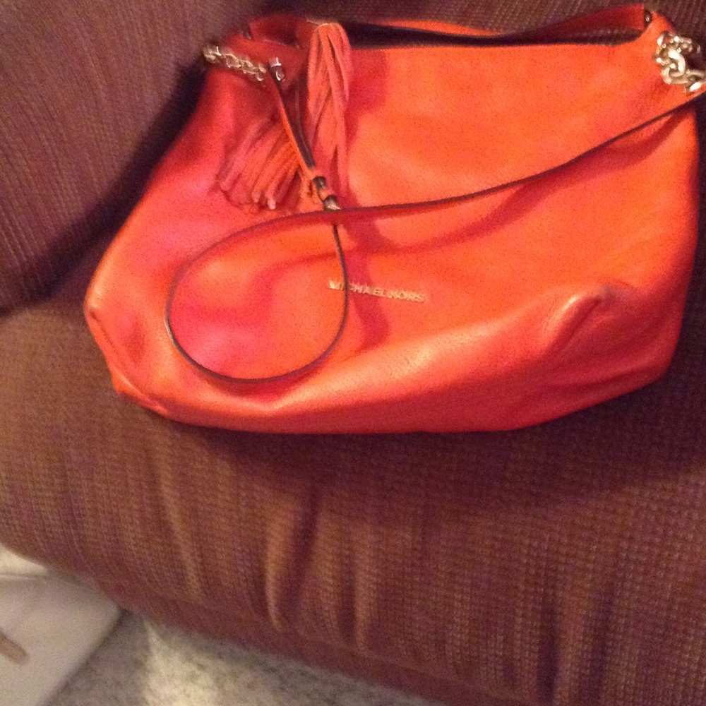 Used Tangerine orange Michael Kors .