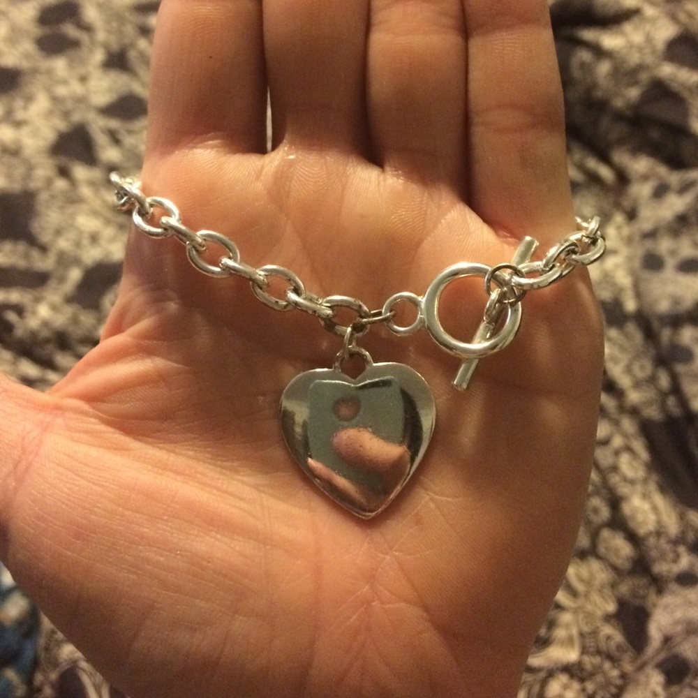 Silver heart bracelet with toggle closure