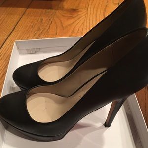 Black platform pumps from Barneys
