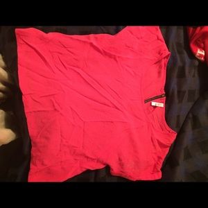 pink top with black zipper in back