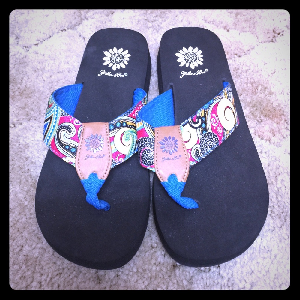 Yellow box flip flops