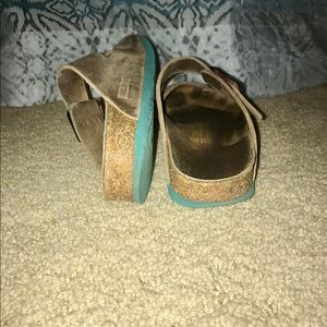 Tan birkenstocks with teal bottom!