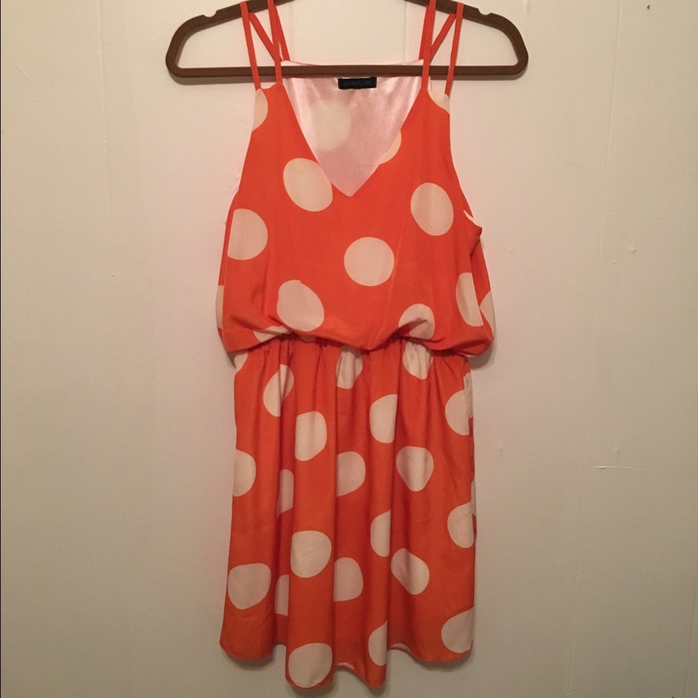 Orange and white polka dot short dress