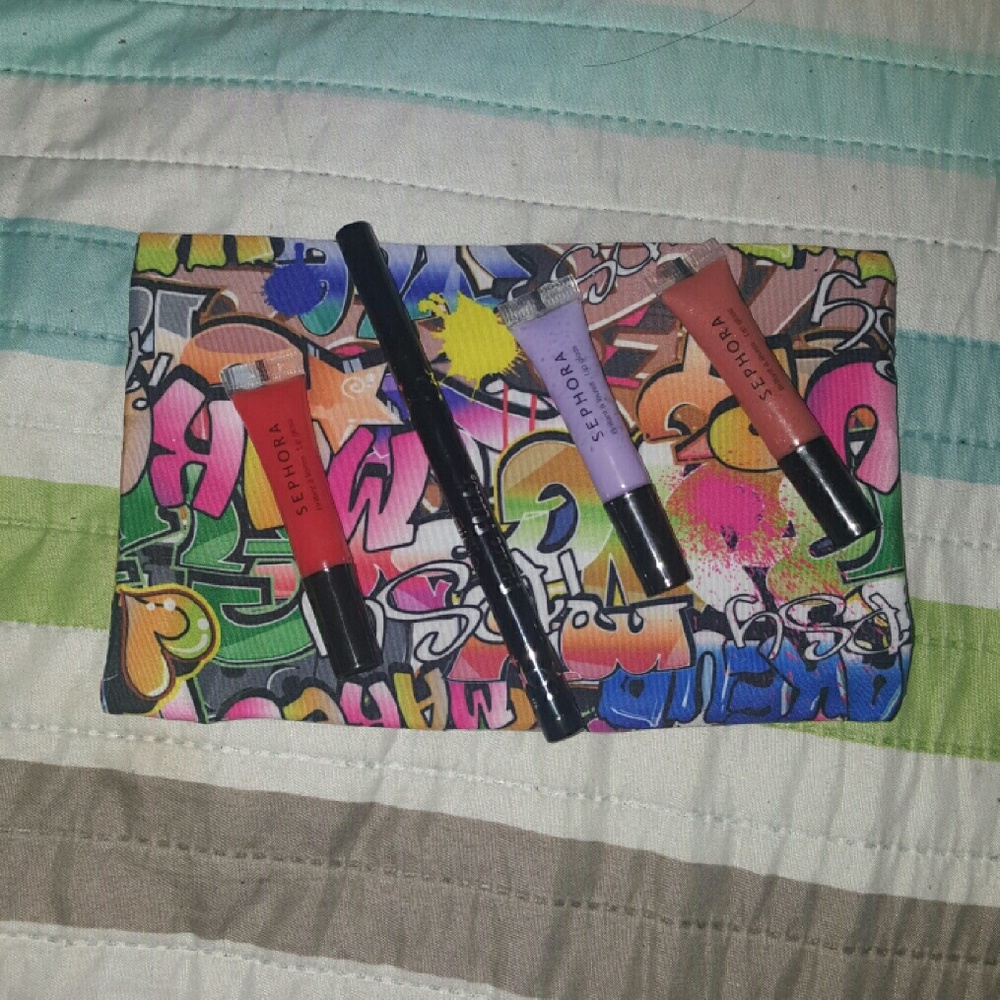 Sephora lip glosses + eyeliner + makeup bag!!