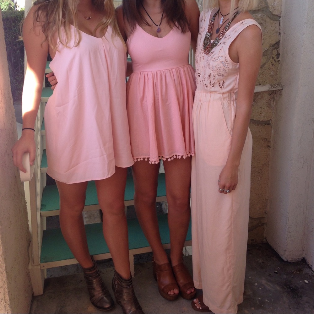 Urban Outfitter's light pink Romper Bodysuit