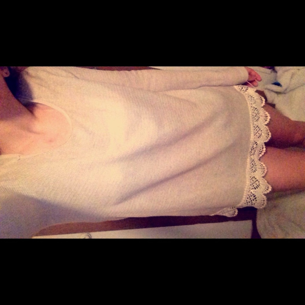 Thin creme colored long sleeved shirt