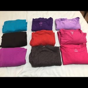 Lot of 9 long sleeved shirts.