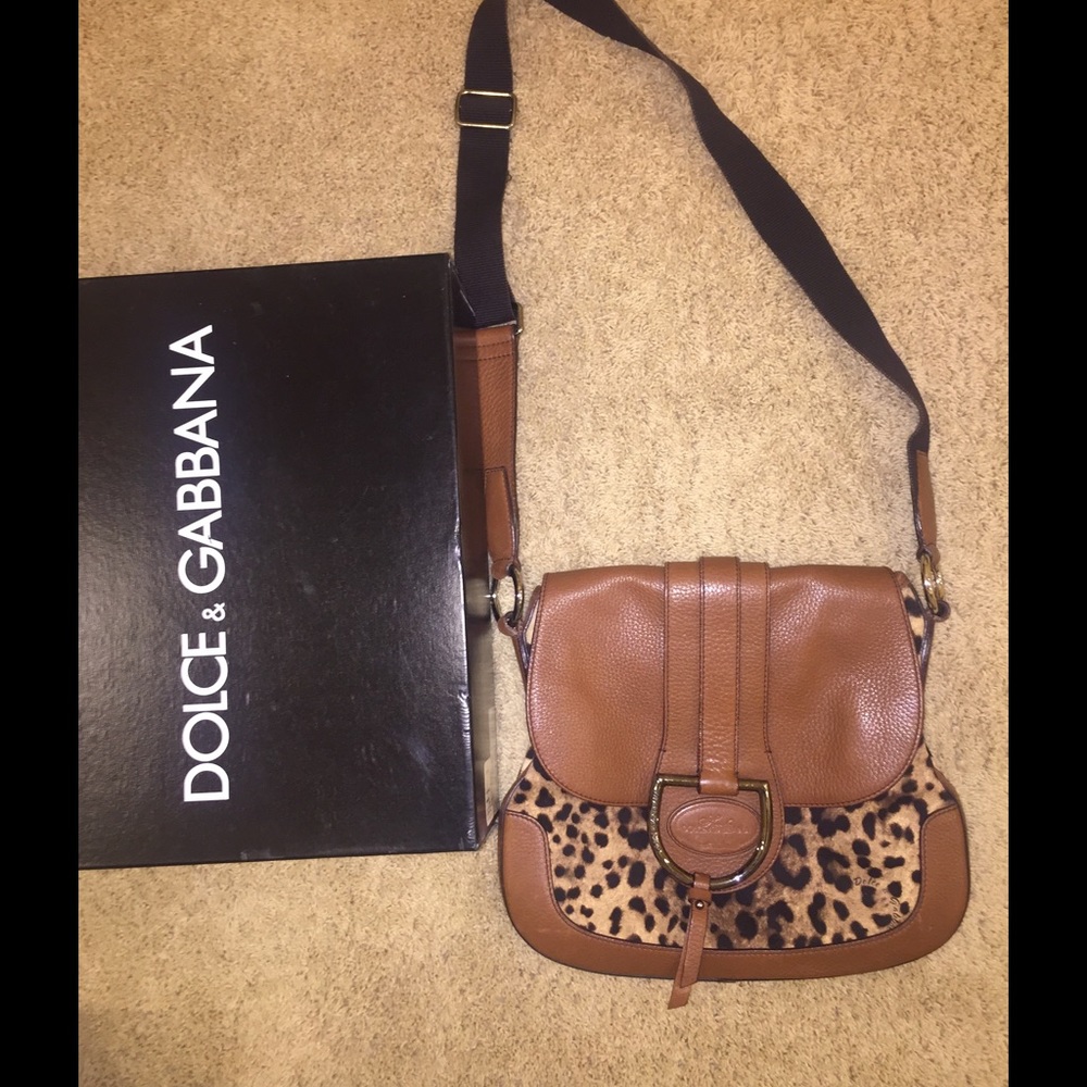 An original Dolce Gabbana cross body purse.