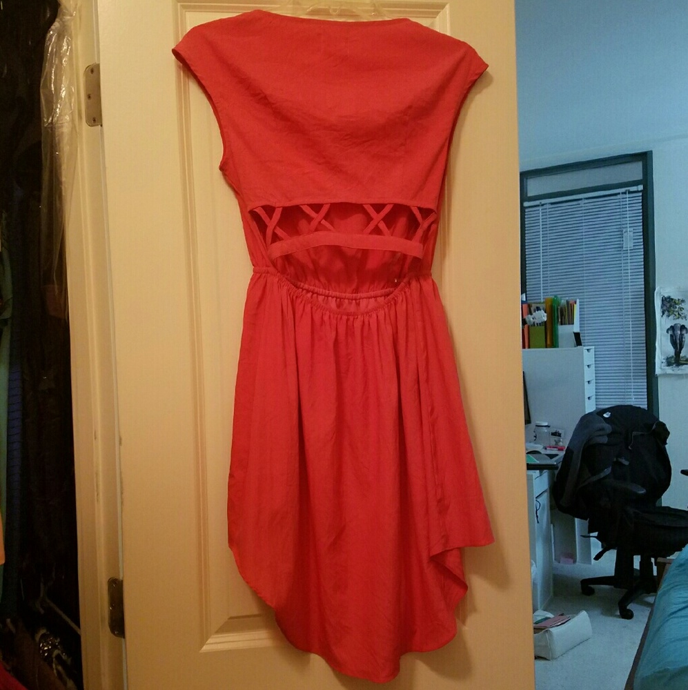 Coral high low dress with cut out back design