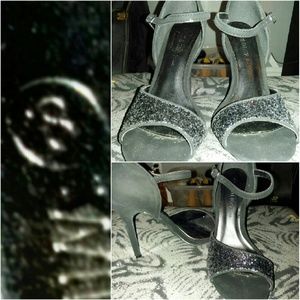 Multi colored sparkly, and black shoes.