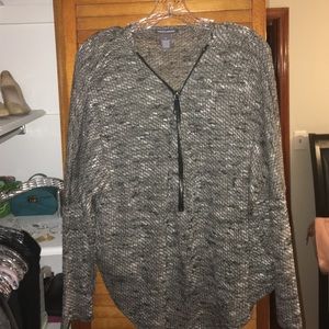 Brand new grey sweater with large black zipper.