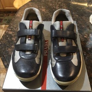 Blue and gray Prada golf shoes
