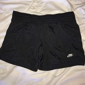 Women's Nike shorts with pockets.