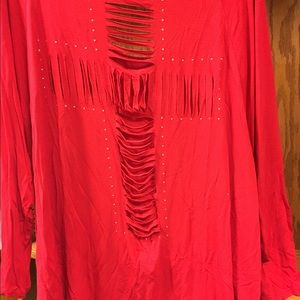 Red tunic with cross cutout